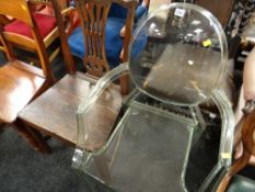 A modern perspex salon armchair together with an antique oak hall chair