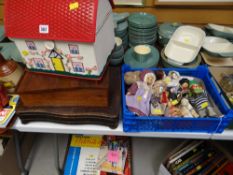 A parcel of dolls, ornaments, novelty cottage, sewing basket etc