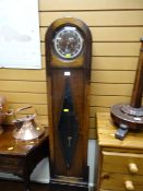 A vintage polished dome top grandmother clock