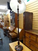 A reproduction mahogany standard lamp & shade