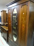 A mahogany mirrored wardrobe & dressing table