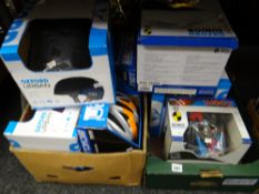 Two boxes of cycling helmets