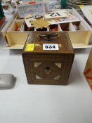 An unusual brass & mother of pearl inlaid tea caddy