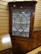 An antique oak corner cupboard / cabinet