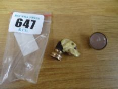 Two yellow metal believed gold seals - one in a form of a dog's head