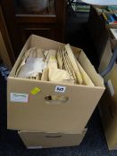 Two boxes of transfers relating to embroidery, needlework etc