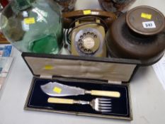 A vintage telephone, a small carboy, a cased fish slice set etc
