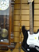 A three-piece cane fishing rod by Geo Wilkins & Son Ltd, Redditch