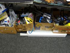 Four boxes of as new cycling accessories including saddles, helmets, lighting, bottles etc