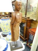 A large carved Oriental figure