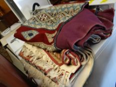 Three woollen crewelwork-style rugs