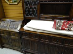 Two items of linen-fold furniture including bureau & dresser