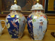 A good pair of large Spode vases decorated with hummingbirds & floral designs