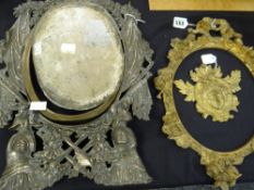 A Rococo-style gilt framed metallic picture frame mirror, a metallic military-type picture frame