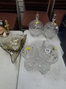 Two cut glass lidded bowls, pair of cut glass vases, art glass shell etc