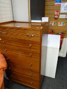 A mid-century chest of six-drawers together with IKEA bedroom table