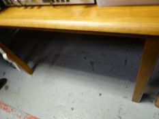 A modern pine effect kitchen table