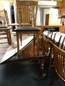 A very large reproduction Julian Bowen dining table & eight chairs