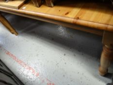 A modern large extending pine kitchen table