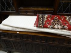 A parcel of three modern rugs