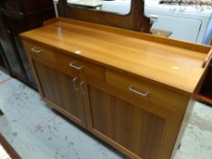 A modern lightwood sideboard