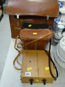 A leather case & contents, two cased pairs of binoculars etc