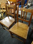 A pair of good antique oak kitchen chairs