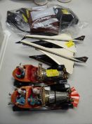 Two Corgi Chitty Chitty Bang Bang models, two models of Concorde & lighters