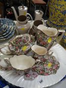 A large blue & white meat dish together with a selection of floral decorated teaware & a Poole