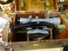 A theodolite in a wooden box
