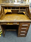 A vintage roll-top kneehole desk (distressed)