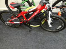 A child's Carrera Blast pedal cycle