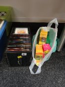 A small collection of classical CDs together with hardback books containing notes on the music