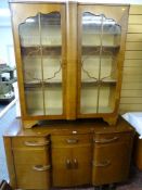 Polished wood railback sideboard and a two door china cabinet