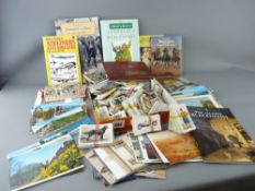 Tray of mixed cigarette cards and a tray of postcards and one or two books including 'How to be a