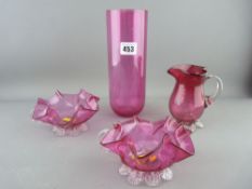 Nice parcel of three cranberry glass items - pair of fluted bon bon dishes with plain handles and