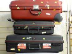 Delsey hard plastic suitcase and another smaller inside and a Samsonite hard plastic suitcase