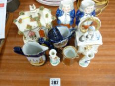 Staffs cottage pastille burner, a pair of lustre decorated gentlemen, a Victorian sideboard type pin