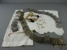 Two electroplated lady's belts, each with scrolled and floral tablets