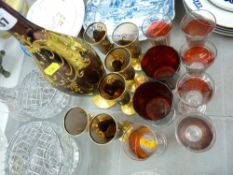 Venetian style decanter and glasses and a quantity of ruby decorated glasses