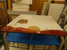 Small metal legged table with 'Camelo Cafe' motif