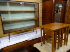 Vintage display cabinet with twin glass sliding doors and a nest of five coffee tables