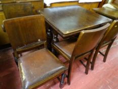 Polished wood draw leaf dining table and four chairs