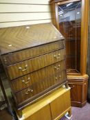 Three drawer writing bureau and a slim corner cupboard with upper glazed door