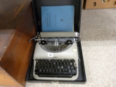 Vintage Remington Rand portable typewriter in case