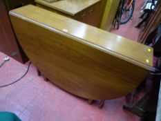 Light wood twin flap gate leg dining table