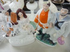 Two Staffs pottery flatback figurines