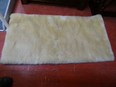 Sykes & Tunnicliffe off-white mohair rug, 137 x 69 cms