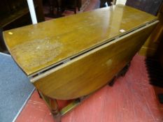 Polished wood twin flap gate leg table