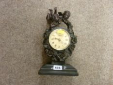 Cherub decorated modern mantel clock
